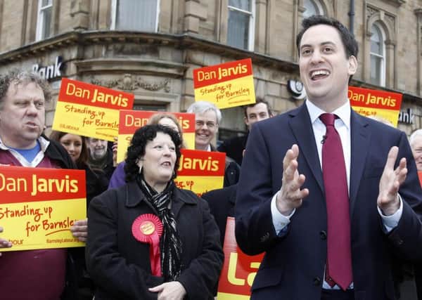 Former Labour leader Ed Miliband pictured in Barnsley town centre celebrating the victory of MP Dan Jarvis in the Barnsley Central by-election in 2011. (PA).