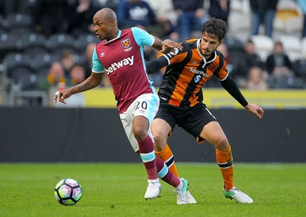 West Ham United's Andre Ayew (left) and Hull City's Andrea Ranocchia battle for the ball during the Premier League match at KCOM Stadium, Hull. (Picture: Richard Sellers/PA Wire)