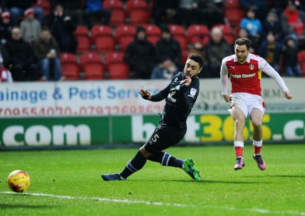 Jon Taylor celebrates scoring for Rotherham United in a difficult season.