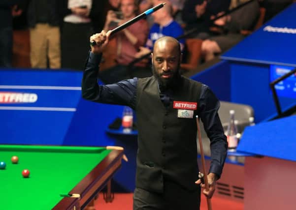 Rory McLeod celebrates after his victory over Judd Trump on day five of the Betfred Snooker World Championships at the Crucible Theatre, Sheffield. (Picture: Nigel French/PA Wire)