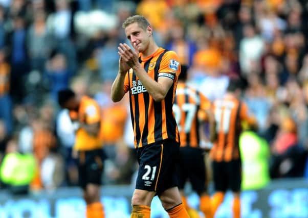 Hull City's Michael Dawson in tears after a goalless draw against Mancheter United signalled relegation for the home side. Picture: Jonathan Gawthorpe.