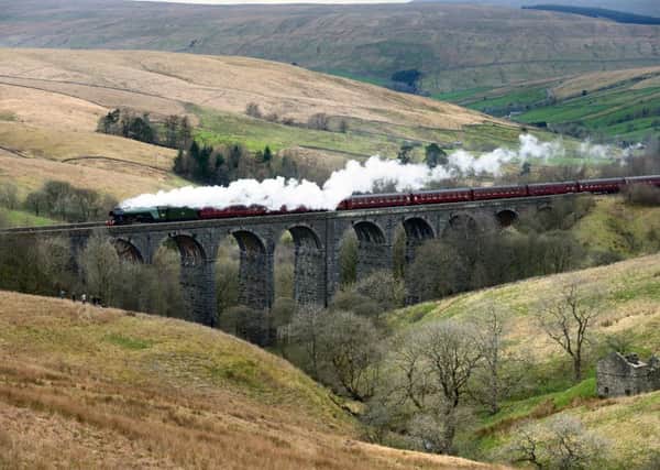 The Flying Scotsman crossing the Dent Head Viaduct on its  return journey from Carlisle to Oxenhope to celebrate the re-opening of the Settle Carlisle Railway last month.