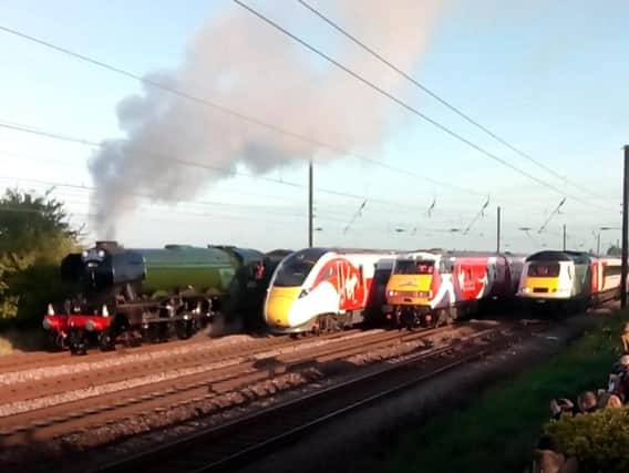 The four trains travelled side by side, in the same direction, at around 6am to celebrate the past, present and future of one of the East Coast Main Line.