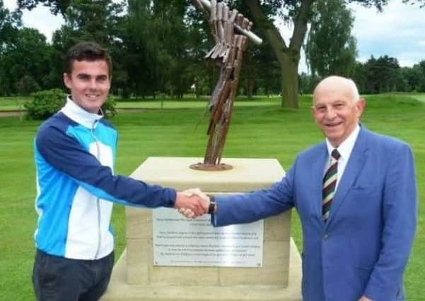David Hague pictured with Harrogate GC official John Robinson after his win in last year's Vardon Grip Trophy.