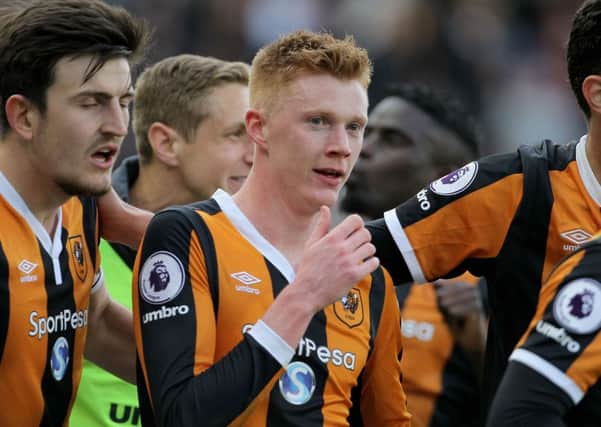 Hull City's Sam Clucas, centre, celebrates scoring his side's second goal in the defeat of Watford (Picture: Richard Sellers/PA Wire).