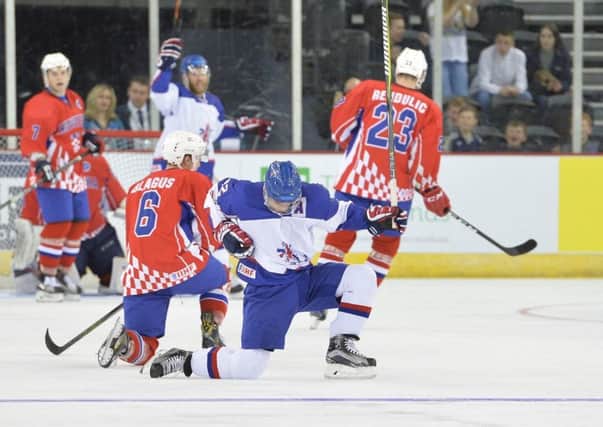 Steelers' Robert Dowd celebrates his goal for GB against Croagtia in Belfast on Sunday. Picture: Dean Woolley.