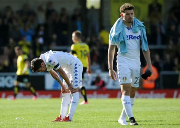 Disapointment for Leeds United's Pablo Hernandez and Kalvin Phillips after defeat to Burton.