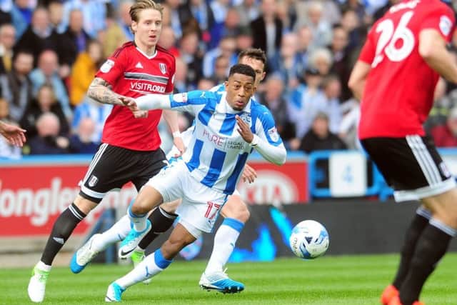 Rajiv Van La Parra breaks away from the Fulham defence in a game in which Huddersfield suffered a heavy defeat.