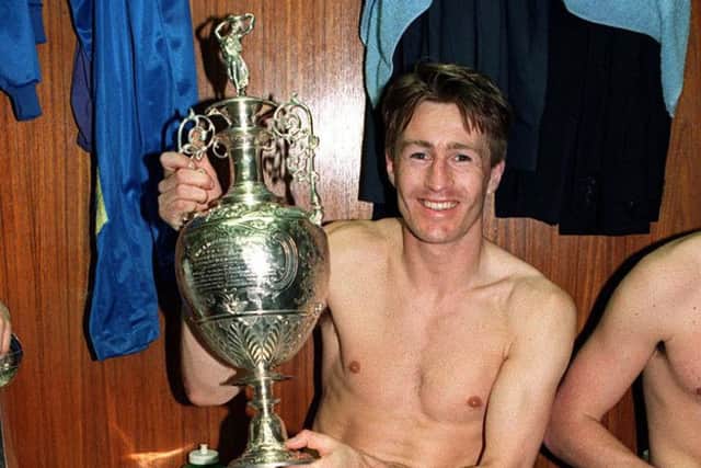 Lee Chapman with the Division One trophy in the dressing room in 1992.