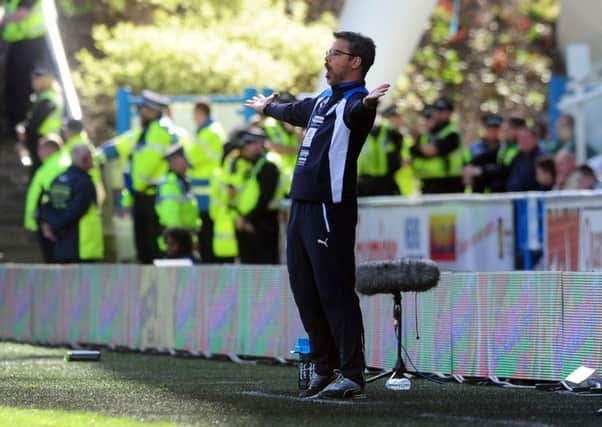 Head coach David Wagner makes an impassioned gesture from the touchline during Huddersfield Towns emphatic home defeat to Fulham on Saturday (Picture: Simon Hulme).