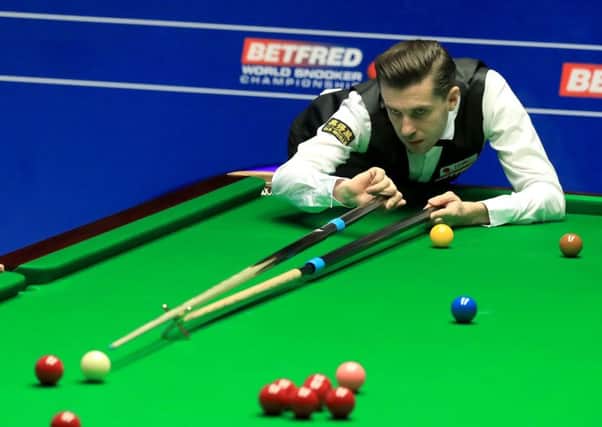 Mark Selby on his way to defeating Xiao Guodong (Picture: Tim Goode/PA Wire).