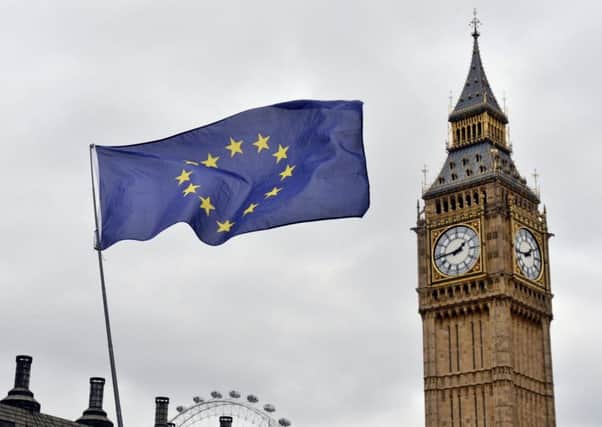 An EU flag flies in front of the Houses of Parliament in Westminster, London, after the letter informing the European Council of Britain's intention to leave the European Union has been handed over to EC president Donald Tusk in Brussels. PRESS ASSOCIATION Photo. Picture date: Wednesday March 29, 2017. See PA story POLITICS Brexit. Photo should read: Victoria Jones/PA Wire