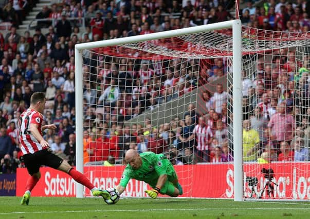 Middlesbrough goalkeeper Brad Guzan denies Sunderlands Donald Love in Boros August win at the Stadium of Light (Picture: PA).