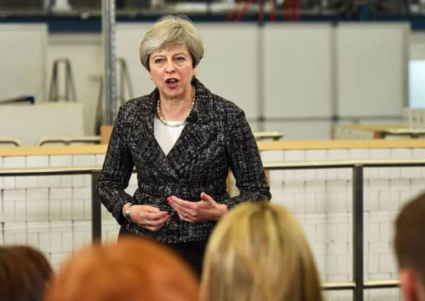 Prime Minster Theresa May on the campaign trail. (PA).