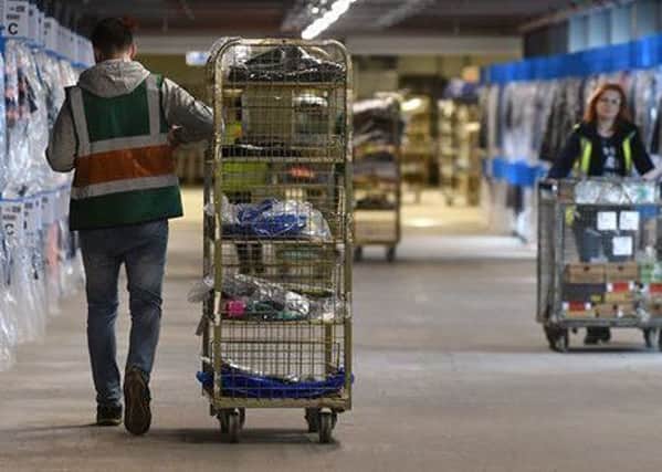 Workers at Sports Directs Shirebrook warehouse supplied by Transline were found to be earning less than the minimum wage. Photograph: Joe Giddens/PA