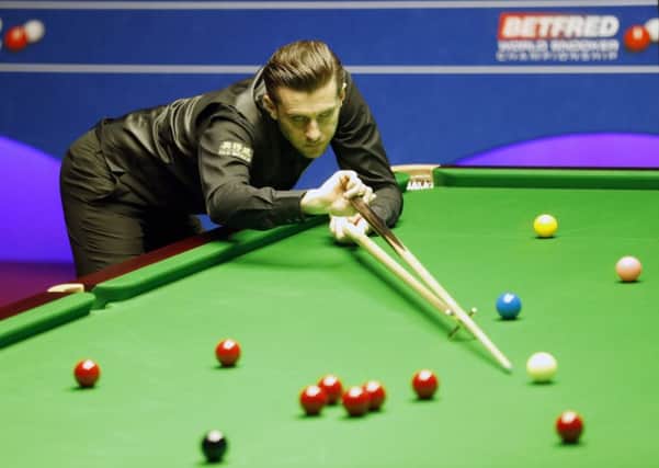 Mark Selby on his way to winning his quarter-final against Marco Fu.
