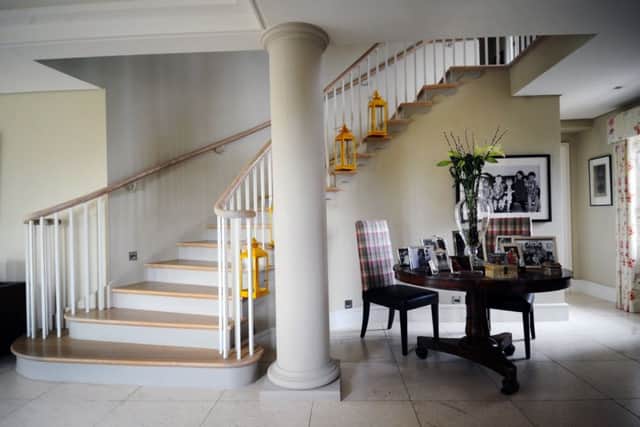 The sweeping staircase was a challenge to design but worthwhile
