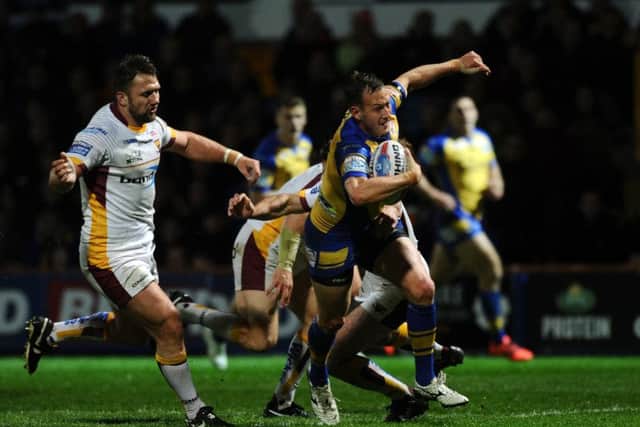 Rhinos' Danny McGuire breaks to score a disallowed try.