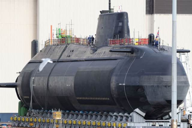 The new fourth Astute-class nuclear-powered submarine, HMS Audacious, outside its indoor ship building complex at BAE Systems, Burrow-in-Furness.