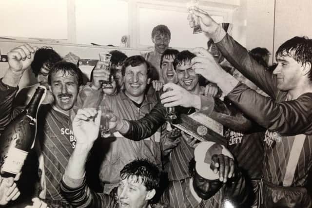 Neil Warnock and his Scarborough players celebrate promotion to the Football League back in 1987.