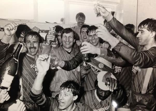 Neil Warnock and his Scarborough players celebrate promotion to the Football League back in 1987.