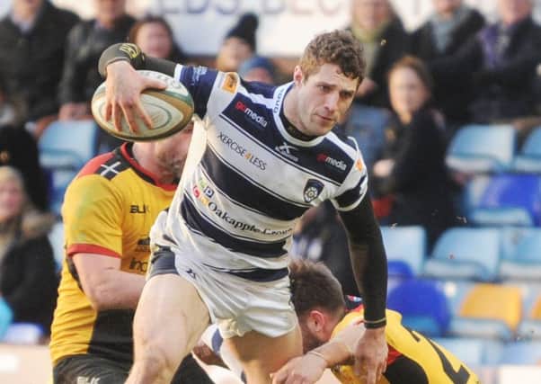Jonah Holmes scored two tries for Yorkshire Carnegie as they defeated Ealing Trailfinders in the Championship play-off semi-final  first leg.