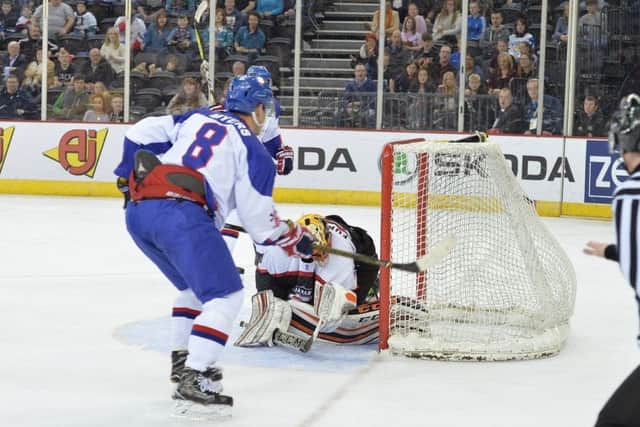 Matthew Myers slots home GB's fourth goal in the second period against Japan. Picture: Dean Woolley.