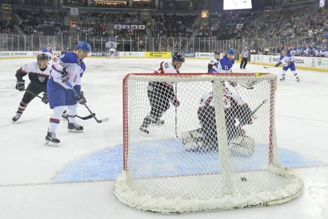 The puck nestles in the net after Brendan Brooks tips in a Rob Dowd shot. Picture: Dean Woolley.