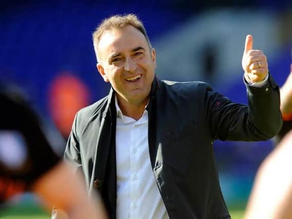 Carlos Carvalhal gives the thumbs up to Owls fans