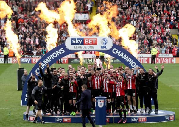 Sheffield United celebrate winning  League One (Picture: Jamie Tyerman/Sportimage)