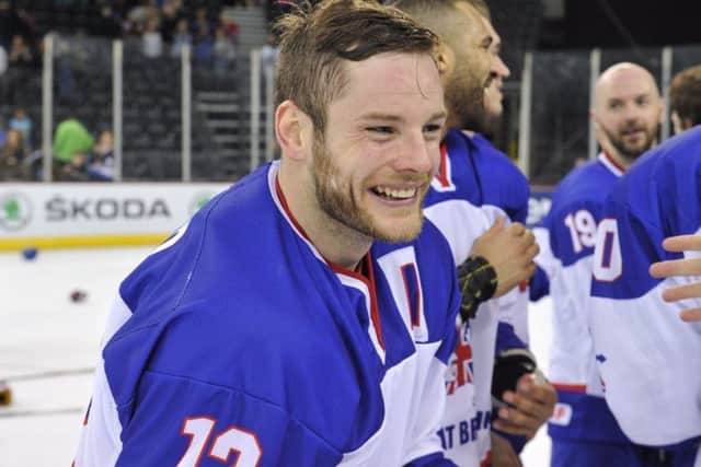 GB and Sheffield Steelers' Robert Dowd celebrates the gold medal in Belfast. Picture: Dean Woolley.