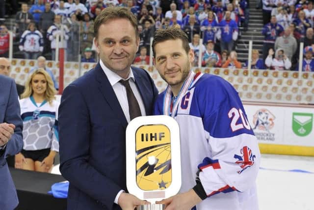 GB and Sheffield Steelers' captain, Jon Phillips, is presented with the Division 1B trophy. Picture: Dean Woolley.