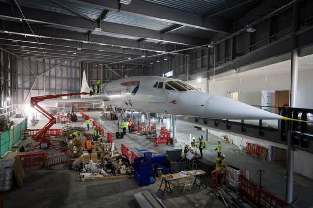 Concorde is unwrapped in its new location at a hanger in Bristol. Picture: SWNS