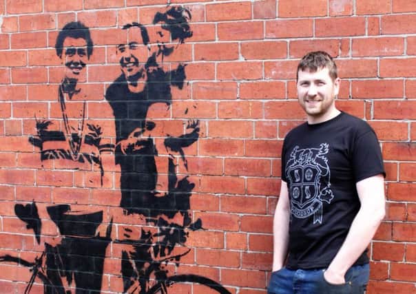 Woodrup Cycles' Anthony Woodrup commissioned a life-sized mural of Leeds champion racing cyclist Beryl Burton