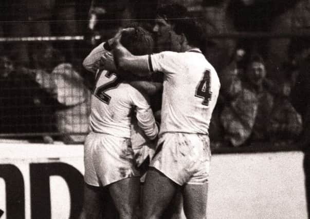 Keith Edwards is mobbed after scoring for Leeds United against Oldham Athletic in 1987  the first player to do so for a Yorkshire side in the play-offs.