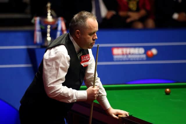 John Higgins reacts during day seventeen of the Betfred Snooker World Championships at the Crucible Theatre, Sheffield. (Picture: Steven Paston/PA Wire)