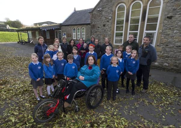 Pupils, parents, and supporters at Horton Primary School, in the Yorkshire Dales, which is set to close. Two more North Yorkshire schools have now been earmarked for closure.