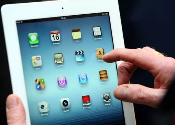 Children are in danger of becoming addicted to iPads and other electronic gadgets, says Jayne Dowle.