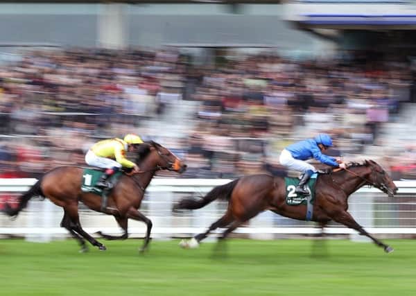 Blue Point ridden by jockey William Buick, right, on the way to winning the Merriebelle Stable Pavilion Stakes
