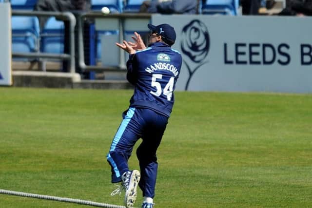 Yorkshire's Peter Handscomb cathes Durham's Keaton Jennings on the boundary.