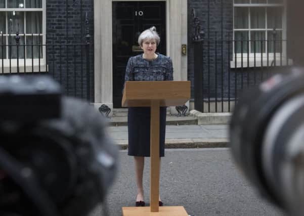 Theresa May, speaking in Downing Street where she used the dissolution of Parliament to accuse the EU of interfering with the June 8 election.