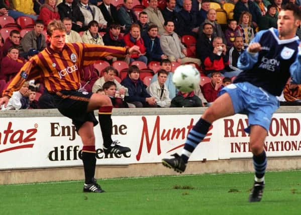 LACE 'EM UP: Chris Wilder pictured in his Bradford City playing days