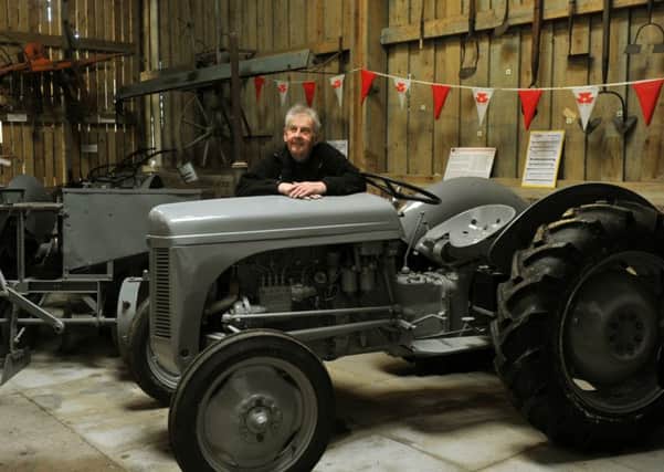 Andy Trezise with his vintage Ferguson T E F tractor at the Yorkshire Museum of Farming at Murton Park near York.
