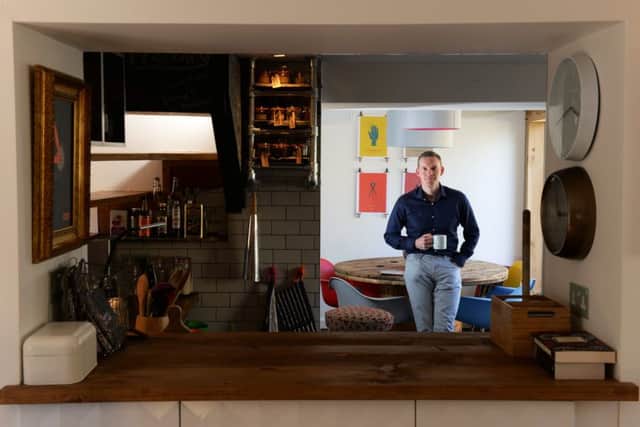 Philip in the semi-open plan space that allows more light into the rooms
