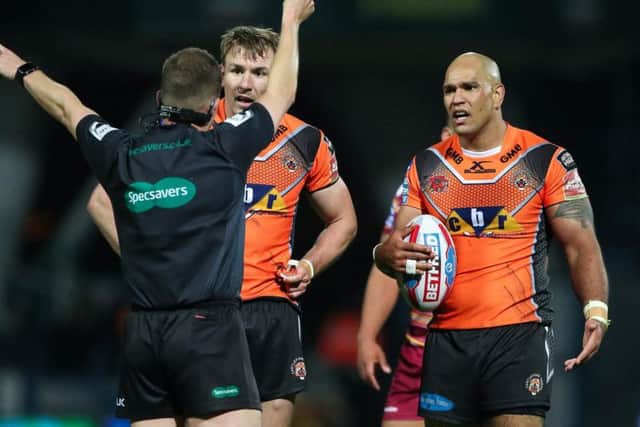 Castleford's Jake Webster (R) looks on in disbelief after being sent to the sin-bin by referee Ben Thaler (Photo: SW Pix)