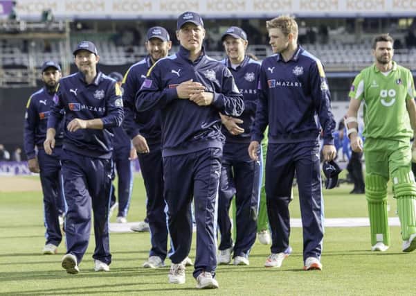 SO FAR, SO GOOD: Yorkshire's Gary Ballance leads his side off the field after victory over Lancashire. Picture: Allan McKenzie/SWpix.com