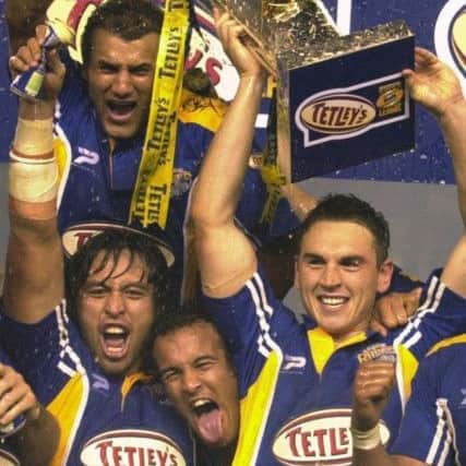 CHAMPIONS: Kevin Sinfield lifts the Super League Grand Final trophy with Mark Calderwood, Willie Poching and Jamie Jones-Buchanan after beating Bradford Bulls in 2004.
