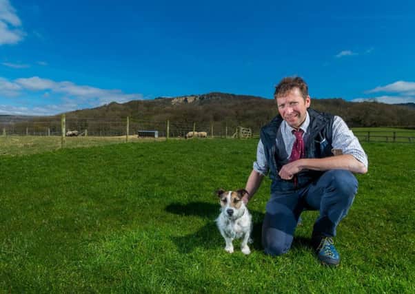 The Yorkshire Vet, Julian Norton, from Skeldale Veterinary Centre, pictured with his three year old Jack Russell, called Emmy. Picture by James Hardisty.
