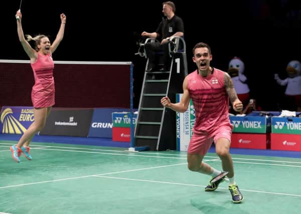 Jumping for joy: Gabby Adcock of Leeds leaps into the air after she and partner Chris Adcock won the European title in Denmark last weekend, defeating the host nations Joachim Fischer Nielsen and Christinna Pedersen. Picture: Yohan Nonotte