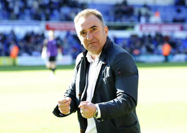 Steely look on the face of Carlos Carvalhal has they move into the Play Offs....Pic Steve Ellis